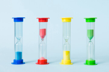 hourglass on the table, sand clock as time passing concept for business deadline, copy space
