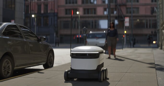 Autonomous delivery robot moves swiftly through a busy city sidewalk, navigating urban infrastructure with smart technology in a modern logistics environment