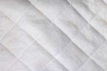 an old cotton fabric with artificial threads from an old used mattress