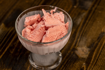 cold ice cream with berry flavor and smell, natural ice cream with added strawberry flavor