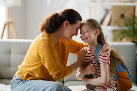 Happy family preparing for school