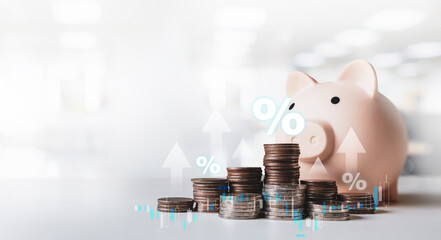 Stack of coins with Finance chart showed a higher interest rates. Business stock growth concept