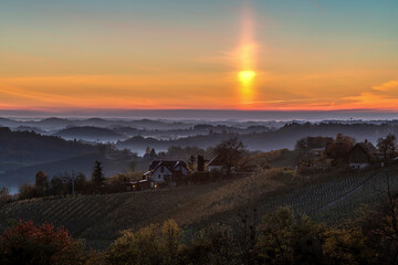 Sunrise over the horizon on a foggy morning. Foggy morning at dawn landscape