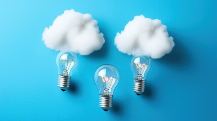 Light bulbs with cloud formations symbolize creativity and ideas against a vibrant blue background.