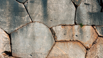 ancient greek letters in stone abstract background