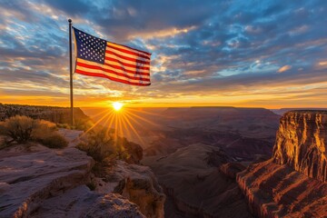 Majestic American flag waving against golden sunset over the Grand Canyon, vibrant colors, dramatic evening lighting. Patriotic wallpaper, 4th of July banner