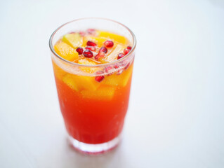 Refreshing Orange and Pomegranate Juice with Fruit Pieces