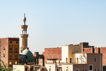  Cairo, Egypt. Panoramic view of Cairo from drone point of view. Mosques and rooftops of buildings....