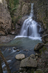 Obraz premium Erikli Waterfall photograph taken with long exposure. Waterfalls in Turkey. Waterfall view in the forest. Erikli Waterfall, Yalova.