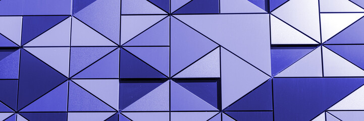 Panoramic image. Blue wall paneling with mosaic triangle background pattern. 3d optics