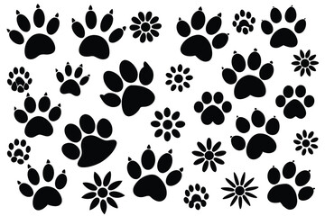 Fototapeta premium Vector illustration of Various Dog Paw Prints black and white.