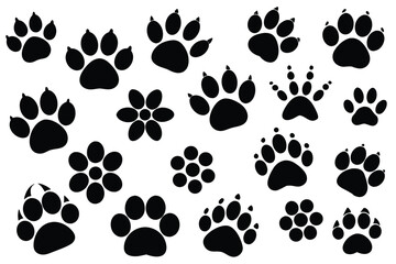 Fototapeta premium Vector illustration of Various Dog Paw Prints black and white.