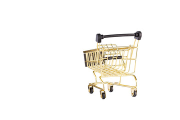 shopping trolley side view gold, yellow and black color cart on isolated white background close up