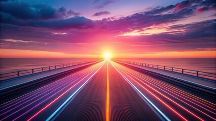 Obraz premium Vibrant Sunset Hues Illuminating a Coastal Highway with Glowing Light Trails at Dawn