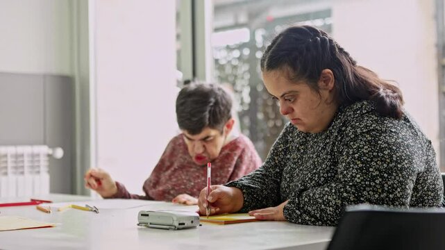 Female residents with mental disabilities engaging in creative activities