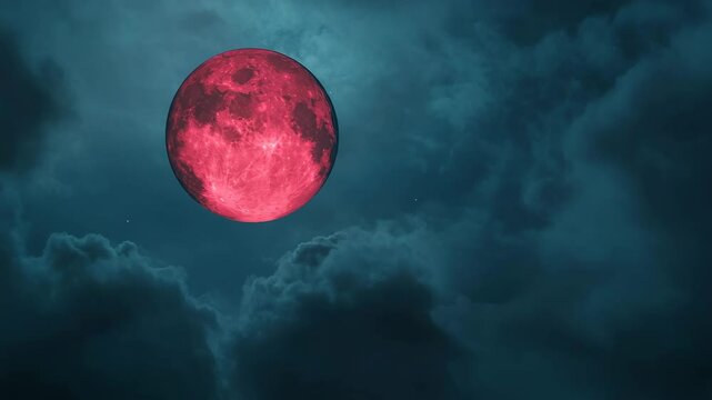Bright red moon in a dark cloudy sky