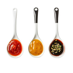 Vibrant display of delicious sauces arranged in elegant spoons for a culinary showcase at a festive gathering