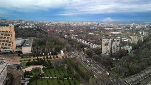 Almaty, Kazakhstan - 04.04.2025 : The river is in the center of the city. Different architecture. The view from the drone. Spring time.