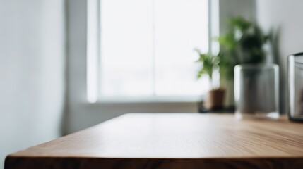 Close-up of an empty wooden table with a minimalist design. Simple and clean lines. The chairs at the back add depth and are perfect for product display mockups and a serene advertising atmosphere.