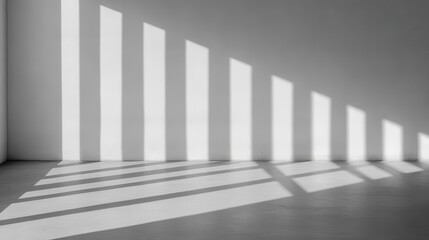 Obraz premium Beautiful interplay of light and shadow casting interesting patterns on a wall, enhancing the minimalist aesthetic of the space.