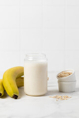 Banana Smoothie with Oats, Healthy Food, Vegan or Vegetarian Diet Food Concept