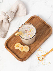 Banana Smoothie with Oats, Healthy Food, Vegan or Vegetarian Diet Food Concept