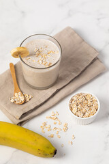 Banana Smoothie with Oats, Healthy Food, Vegan or Vegetarian Diet Food Concept