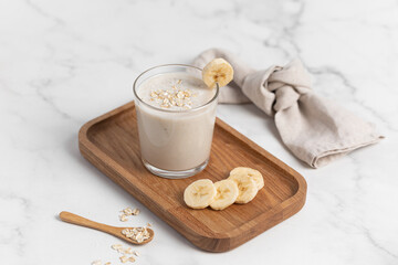 Banana Smoothie with Oats, Healthy Food, Vegan or Vegetarian Diet Food Concept