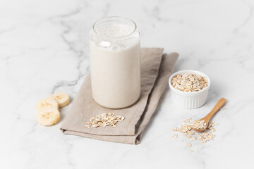 Banana Smoothie with Oats, Healthy Food, Vegan or Vegetarian Diet Food Concept