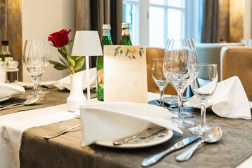 Restaurant. A table set for dinner. Frame for text
