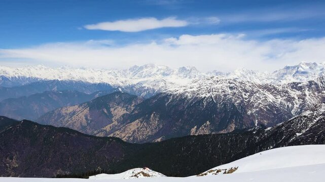 breathtaking view of snowy mountains with bright blue horizon