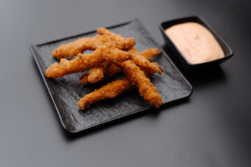 Crispy Golden Fried Appetizer Served with Dipping Sauce