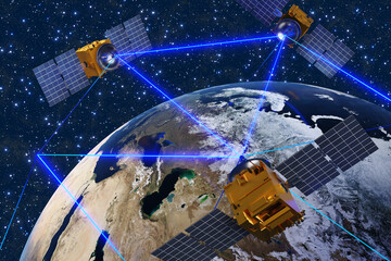 Satellites surrounding the planet Earth and sending blue laser beams to each other for communication. Illustration of the concept of telecommunication and satellite mobile phone network