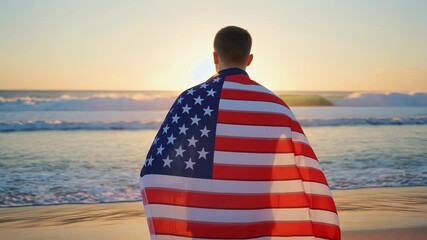 Man wrapped in American flag standing by ocean at sunrise, patriotic and reflective mood.
- Powered by Adobe