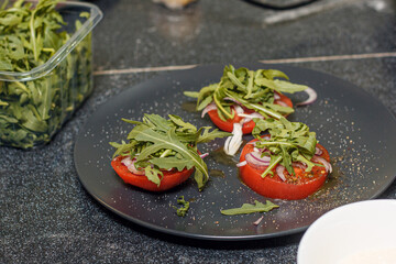 tomato carpaccio with arugula