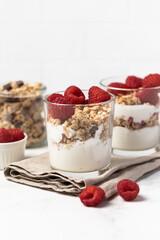 yogurt with granola and raspberries