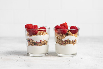 yogurt with granola and raspberries