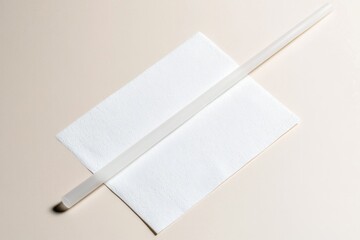 Fototapeta premium Minimalist design featuring sleek pen resting on crisp sheet, em
