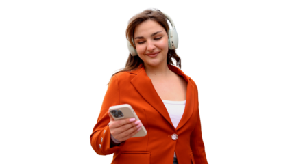 Young businesswoman wearing an orange blazer using a smartphone and listening music with wireless headphones, transparent background