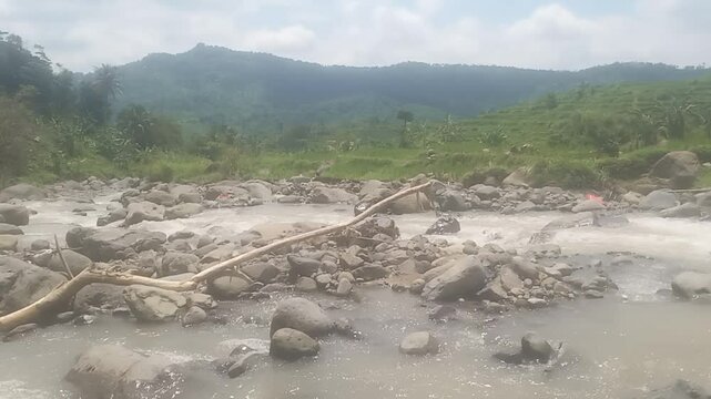 Side of river near Sukamakmur, West Java, Indonesia. Video was taken with Vivo Y15 during mid day.