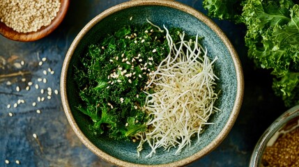 Photograph of bowl with sprouted mung beans, shredded kale and sesame seeds