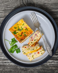 Baked Denver Omelette on a plate with fork
