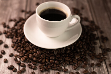 A cup of morning coffee. Morning coffee. Sunlight falling on a cup of coffee