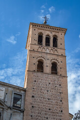 Fototapeta premium Mudejar style brick tower of the church of San Roman in Toledo. Spain