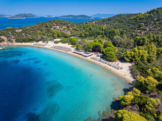 Aerial view of the popular beach and at Tsougrias island, Skiathos, Sporades, Greece, excursion point for tourists and cruises