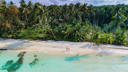 Discover the stunning views of Koh Kood Islands golden beach in Thailand, where natures beauty and...
