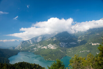 Aerial View of Lake Molveno – Alpine Lake Surrounded by Forest and Mountains in Trentino, Italy