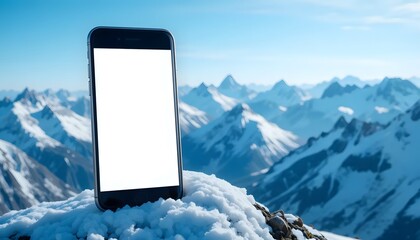Smartphone with blank screen balancing on a mountain peak