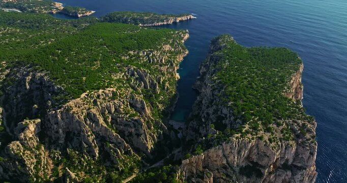 Aerial View of Calanque dEn-Vau near cassis town provence France. Breathtaking view of bay, a beautiful blue lagoon with a white sand beach, surrounded by cliffs, pines, near Marseille in France
