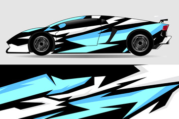 Obraz premium Sleek, modern sports car with dynamic blue and black design parked against a neutral backdrop